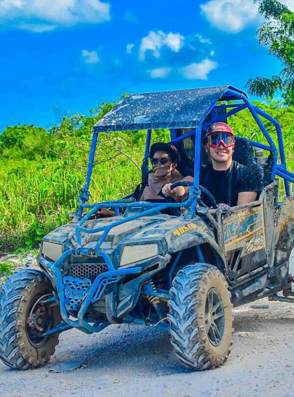 Swimming in a natural cave during Buggy Predator Adventure Punta Cana