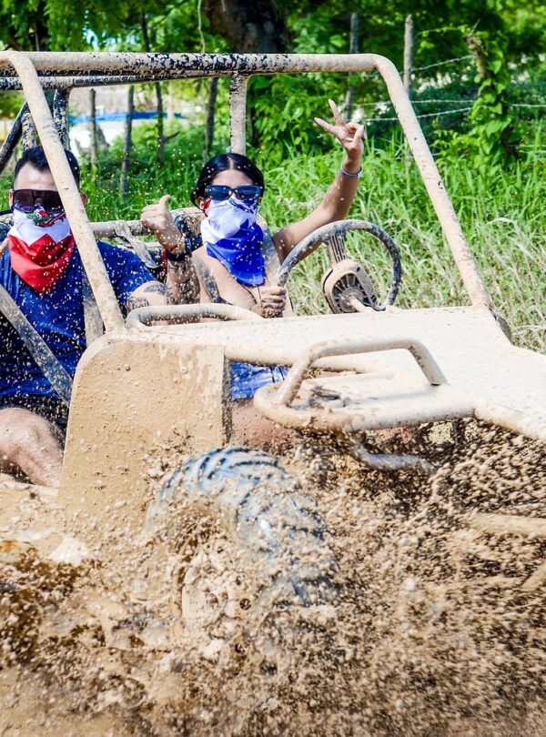 Dune buggies parked near a pristine Punta Cana beach